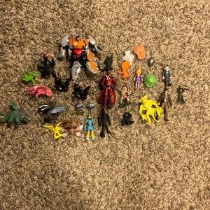 Lot of action figures how to train your dragon scobby do xmen Indian jones etc